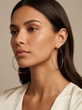 77: House of Harlow 1960 Gold Plated Hoop Earrings